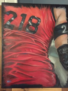 Oil painting of a roller derby players back, bearing the number 218